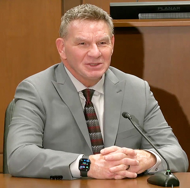Richard Worley address the town hall
