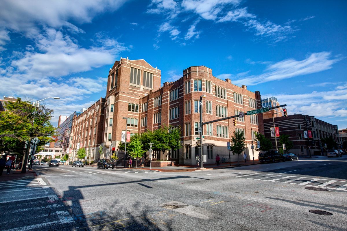 Exterior shot of the law school building with a bright blue sky
