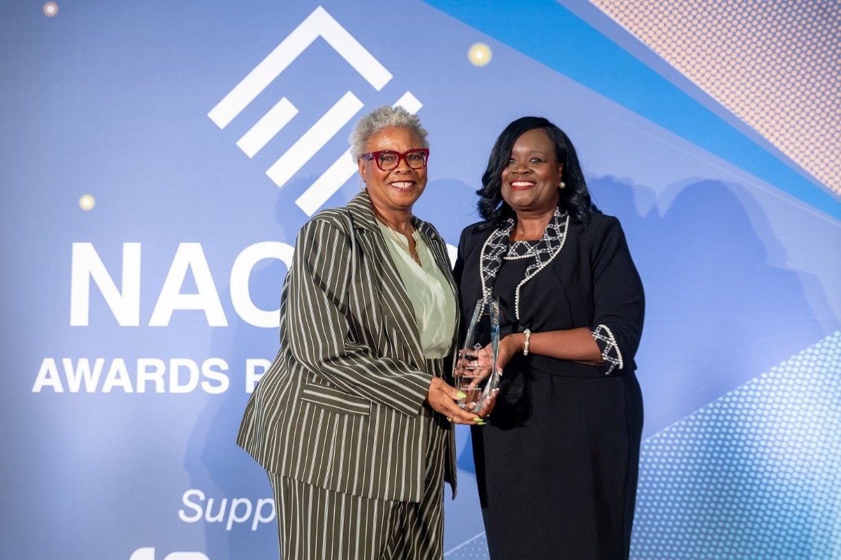 UMB's Dawn Rhodes accepts the NACUBO 2026 Distinguished Business Officer Award