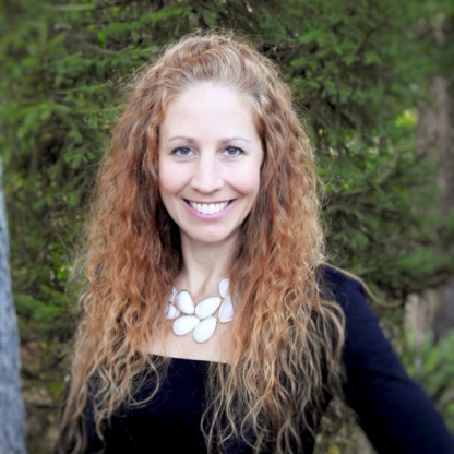 Woman with curly brown hair