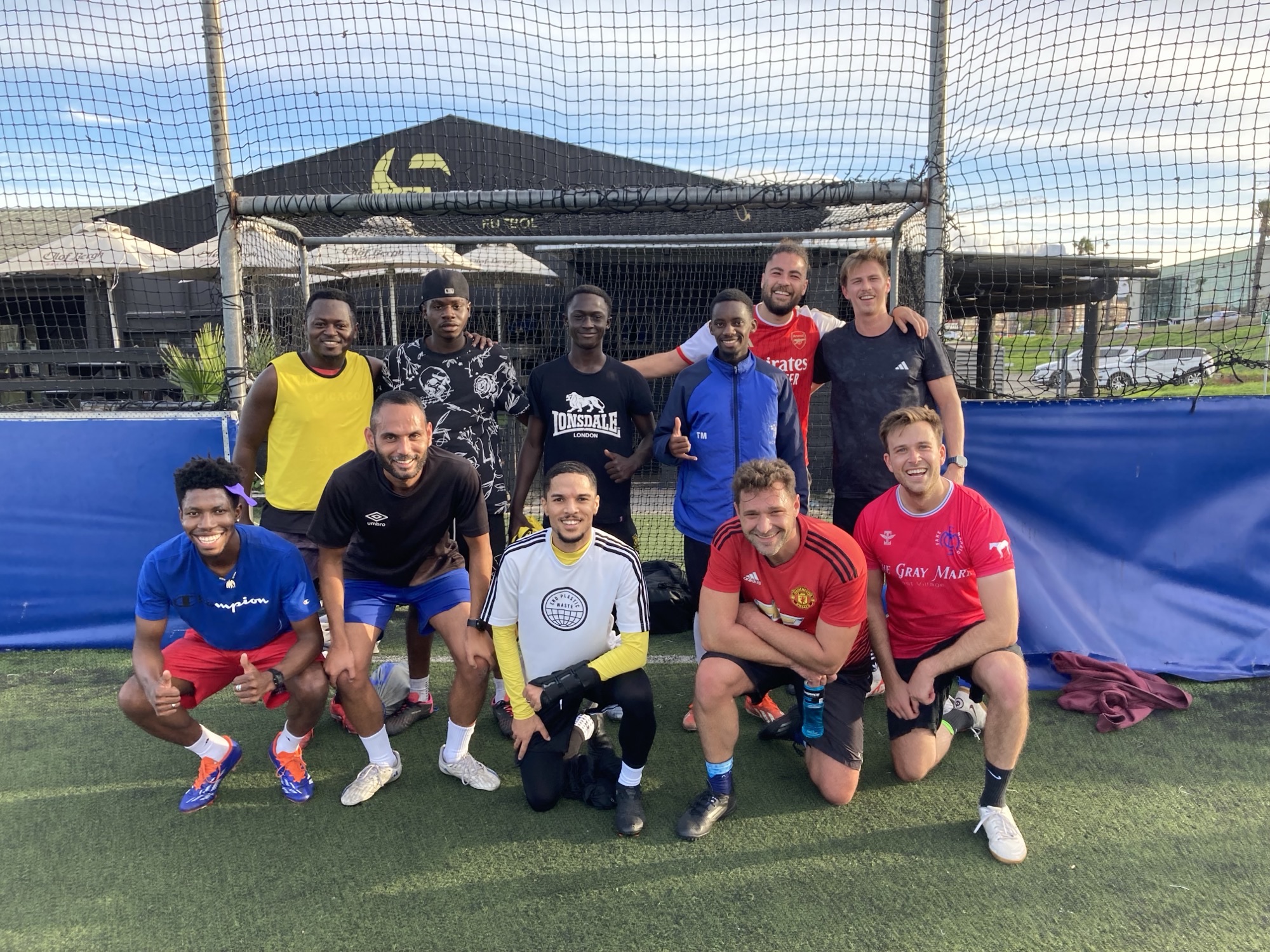 Matt Suzor, JD (front row, right), played soccer every Sunday while he was abroad in Cape Town, South Africa, during his final semester of law school. 