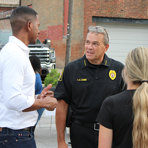 Chief Leone talking with community members