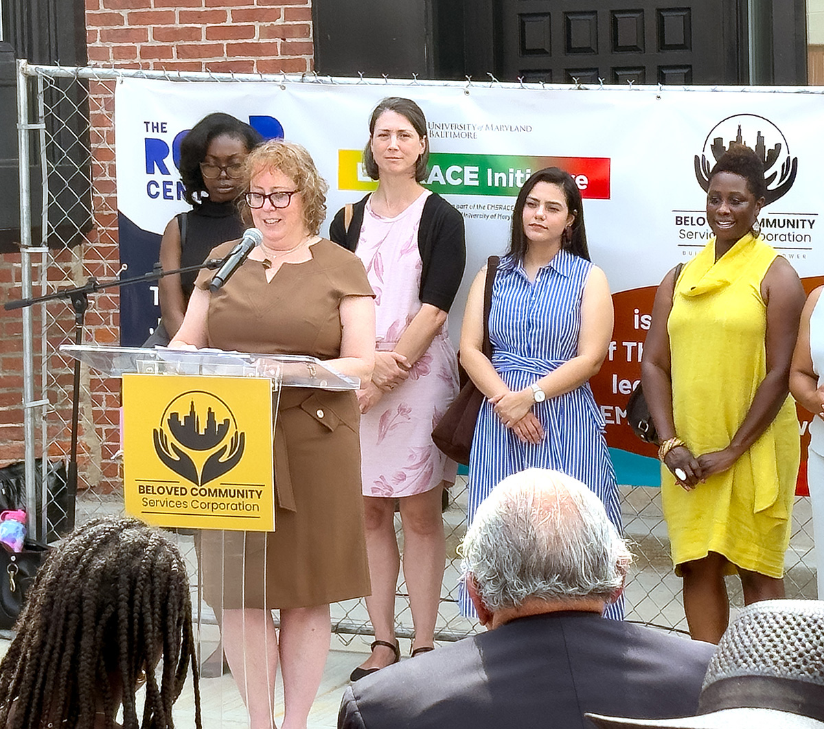 Lydia Watts, executive director of ROAR, speaks at the dedication of the center's new offices in West Baltimore.