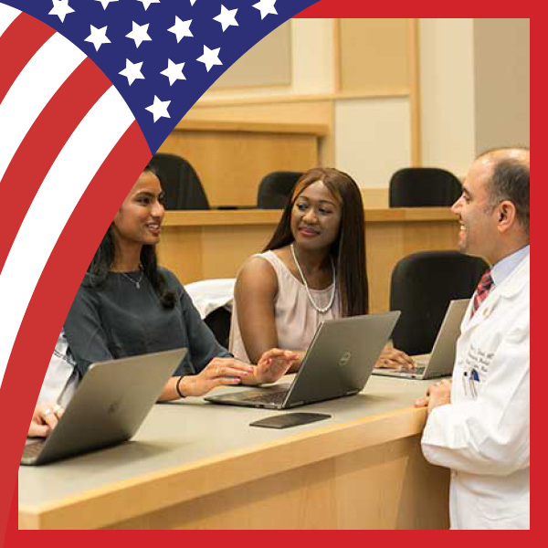UMB Celebrates America at 250 with U.S. flag theme and a teacher and two students