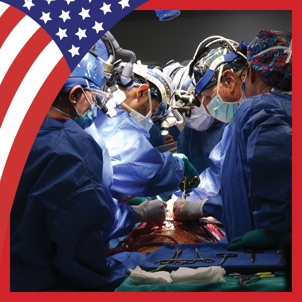 UMB Celebrates America at 250 with U.S. flag theme and photo of surgeons performing a heart transplant