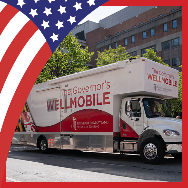 UMB Celebrates America at 250 with U.S. flag theme and photo of the Governor's Wellmobile