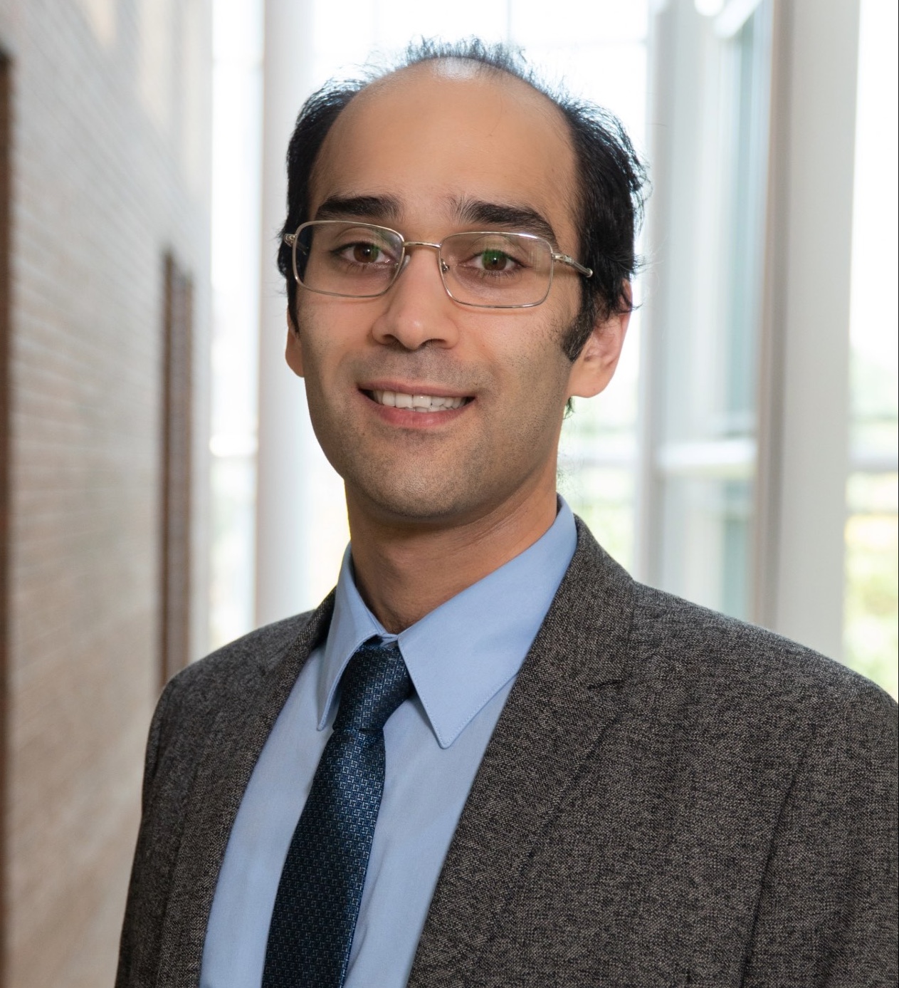Headshot photograph of Zafar Zafari facing the camera. 