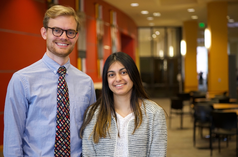 Students Suhani Chitalia and Michael Sikorski, third-year students at the Carey School of Law and the School of Medicine, respectively, pose for a photo.