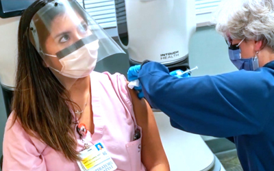 Staff receiving COVID-19 vaccine
