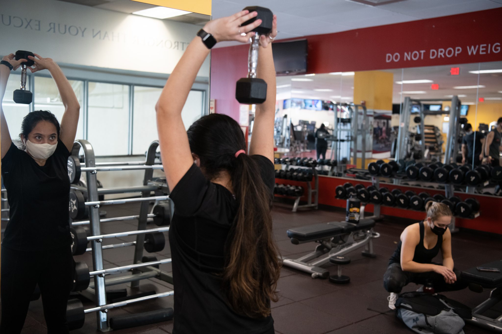 Woman exercising with weights