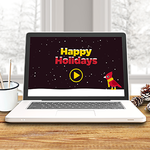 Computer screen with cardinal and Happy Holidays