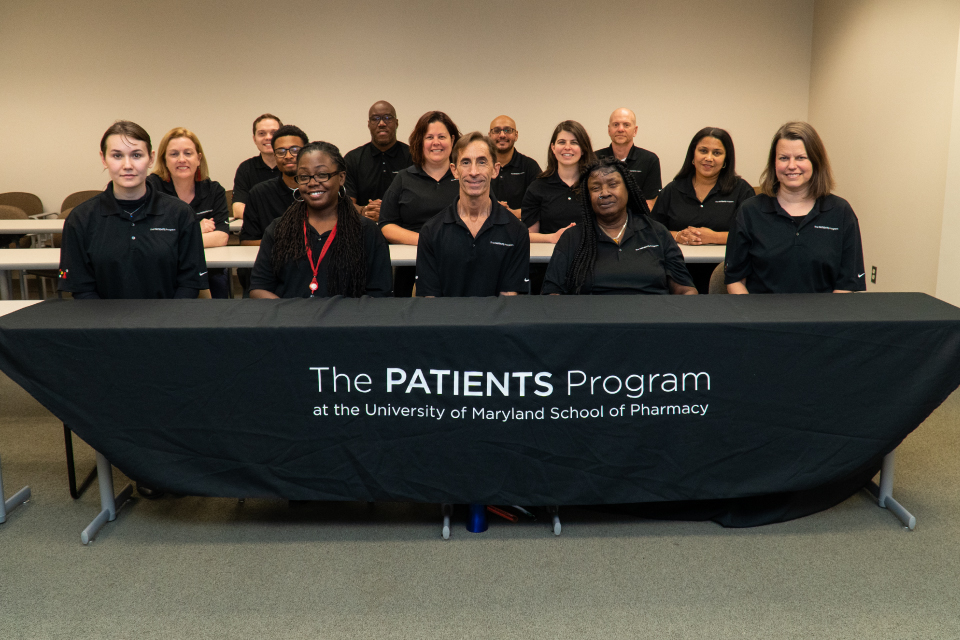 Staff members from The PATIENTS Program pose together for a team photo.