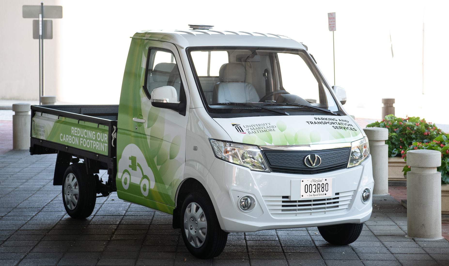 Photo of the new Vantage E-active truck for the Office of Parking and Transportation Services at UMB.