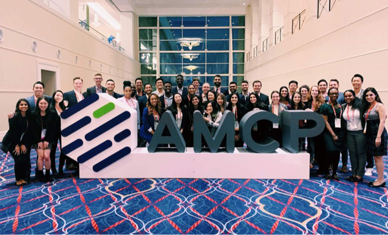 Members of the School of Pharmacy's AMCP student chapter photographed together at a national conference.