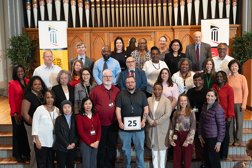 UMB employees who celebrated 25 years of service to UMB are seen in a group photo.