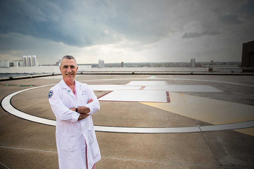 Thomas Scalea, Physician in Chief of the R Adams Cowley Shock Trauma Center, stands at the center’s helicopter landing area.