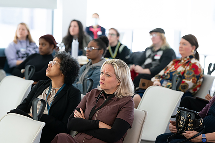 Attendees listen intently to Rhea Roper Nedd's Values in Action Speaker Series presentation.