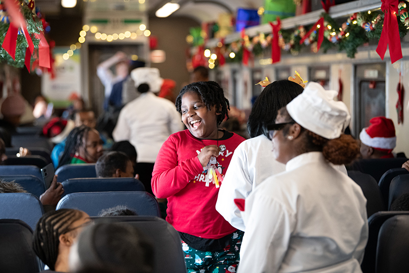 A girl enjoys the Polar Express Experience