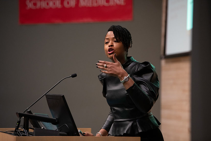 Chris Pernell delivers her keynote speech during UMB's MLK and Black History Month Celebration on Feb. 5, 2026.