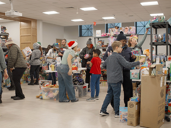 Shoppers browse items at the Christmas Store