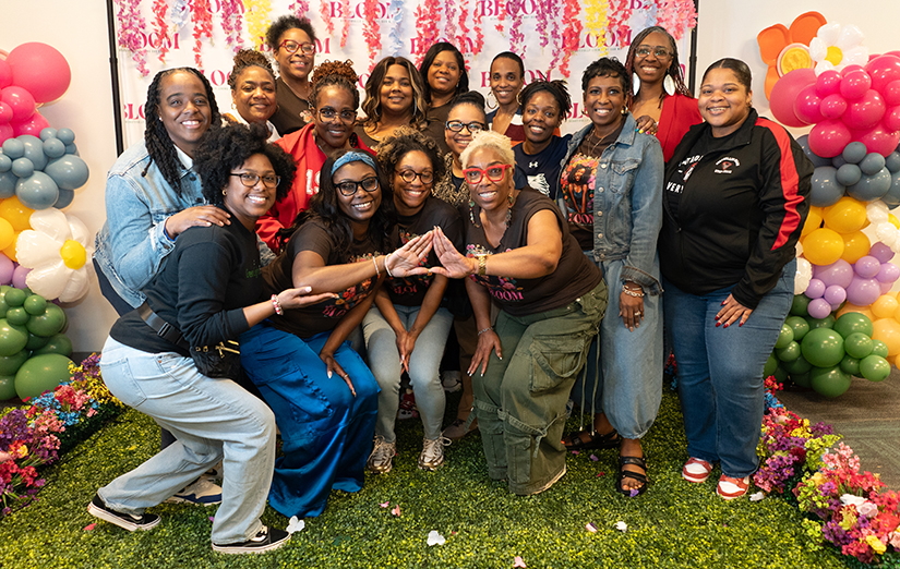 Attendees of the “This is Bloom: Beautifully Living Out Our Me” event in a group photo.