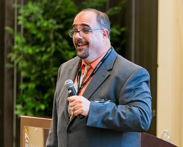 Sol Roberts-Lieb speaks during a LEAPS Symposium in 2024.
