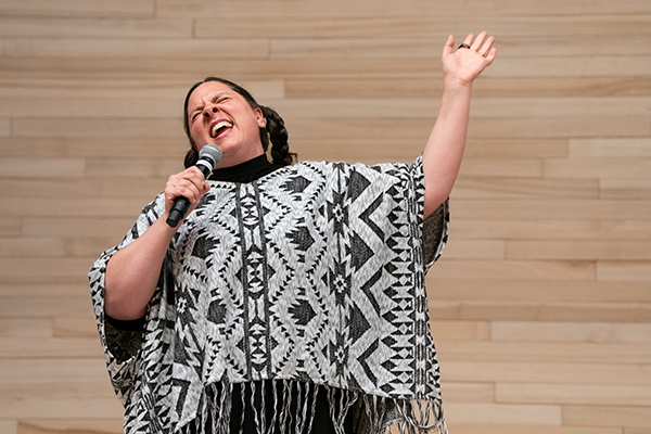 Woman singing at the 2025 UMB's Got Talent show