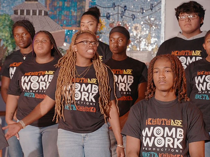 Students perform a scene from WombWork Productions’ “What They Don’t See” at the UMB Community Engagement Center.