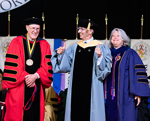 Bruce Jarrell, Geoff Greif, and Judy Postmus at the 2023 UMB Faculty Convocation